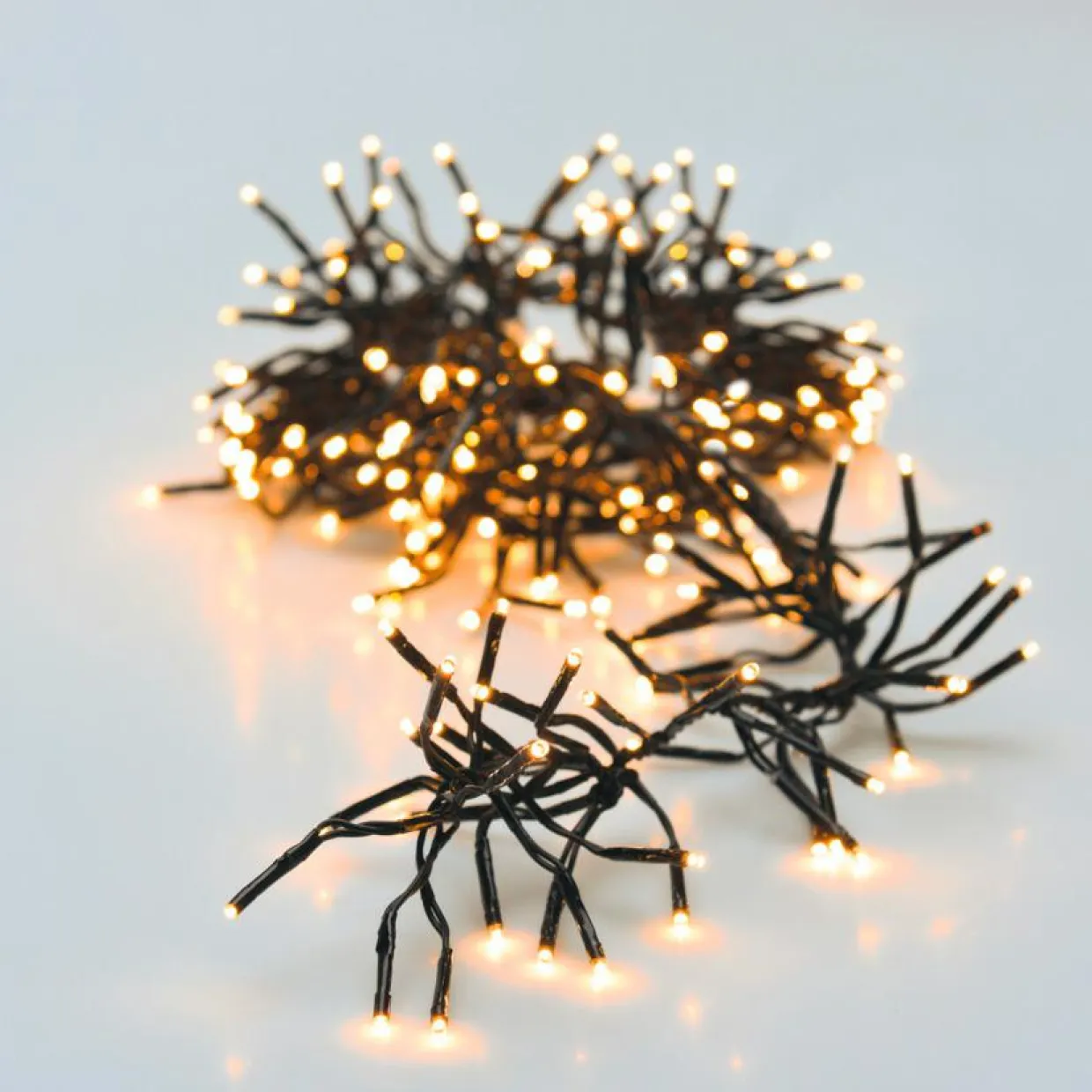Guirlande lumineuse 5,50 m 768 LED câble noir Boa Blanc extra chaud