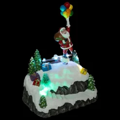 Scène de vie illuminée et animée (H22 cm) Envol du Père Noël