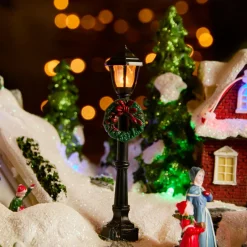 Village de Noël lumineux et animé (H31 cm) Aventures d'hiver